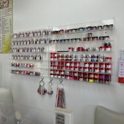 Windy's Nail And Spa - A display of the large number of nail polish