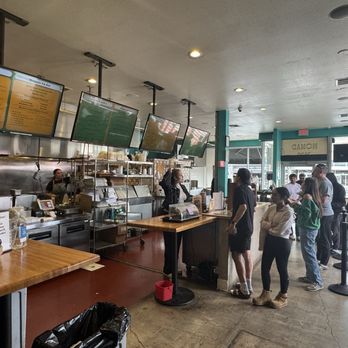 Nomad Donuts - Inside is pretty busy at 12:30pm on Saturday - Donuts Near Me - San Diego, California Nomad Donuts - Inside is pretty busy at 12:30pm on Saturday - Donuts Near Me - San Diego, California