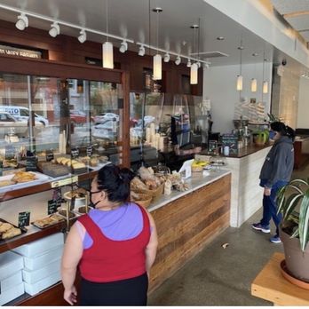 Hayes Valley Bakeworks - a woman standing in front of the counter - Bakeries Near Me - San Francisco, California