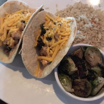 Pub W - Spicy shrimp tacos, rice, balsamic glazed brussel sprouts. - Pubs Near Me - Tulsa, Oklahoma Pub W - Spicy shrimp tacos, rice, balsamic glazed brussel sprouts. - Pubs Near Me - Tulsa, Oklahoma