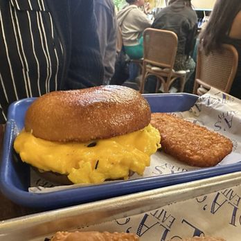 Lola's Eatery - My wife's scrumptious breakfast sandwich and hashbrown. - Breakfast & Brunch Near Me - Pittsburgh, Pennsylvania