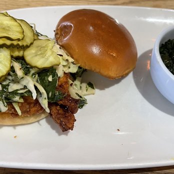 Folk Art - Fried Chicken Sandwich w/ a side of spinach - American Near Me - Atlanta, Georgia Folk Art - Fried Chicken Sandwich w/ a side of spinach - American Near Me - Atlanta, Georgia