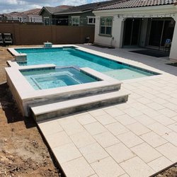 Elite Pool Servicing & Remodeling - New Pool & Spa Build with Travertine Completion
