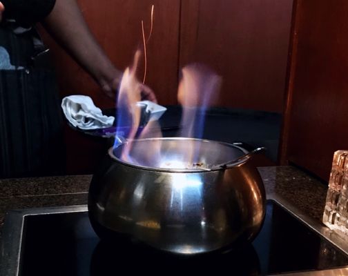 Photo of The Melting Pot - Darien, CT, US. 4th course: a sprinkle of cinnamon into the fondue