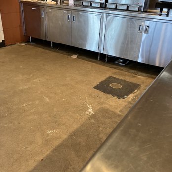 CAVA - Floor in front of drink station - Mediterranean Near Me - Melville, New York CAVA - Floor in front of drink station - Mediterranean Near Me - Melville, New York