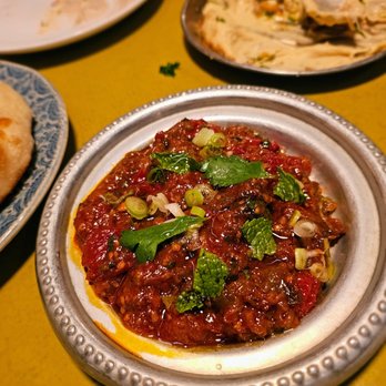 Shukette - Matbucha- Roasted eggplant, charred tomato, pepper, mint, and cilantro. $12. Nice and smoky with a bit of heat - Middle Eastern Near Me - New York, New York