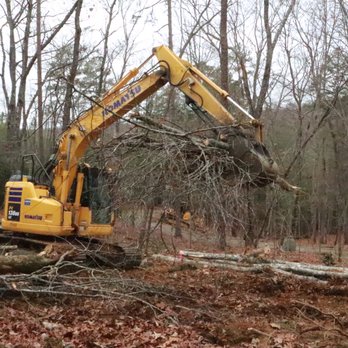 Landscapes Complete - a bulldozer in the woods - Landscaping Near Me - Murphy, North Carolina Landscapes Complete - a bulldozer in the woods - Landscaping Near Me - Murphy, North Carolina