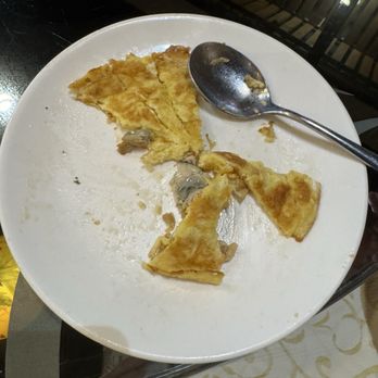 MingHin Cuisine - Oyster egg Pan-Fried Baby Oyster Omelet. This dish is so sad. The spoon is bigger than the food inside the dish. - Seafood Near Me - Chicago, Illinois