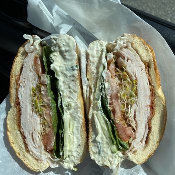 Bagel World Bakery & Deli - A cross section of my go-to smoked turkey everything bagel sandwich with bacon. - Bagels Near Me - Peabody, Massachusetts Bagel World Bakery & Deli - A cross section of my go-to smoked turkey everything bagel sandwich with bacon. - Bagels Near Me - Peabody, Massachusetts