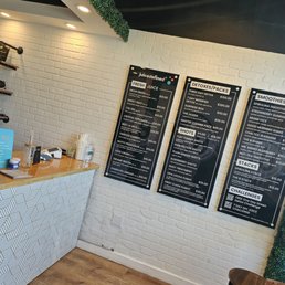 menus on the wall of a coffee shop