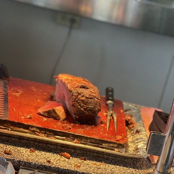 Bird of Paradise - roasting meat on a cutting board - American Near Me - Ewa Beach, Hawaii