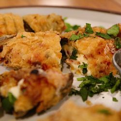 Hedera Tropical Grill - Tropical Stuffed Jalapeños filled with a
creamy blend of pineapple, cream cheese, and bacon