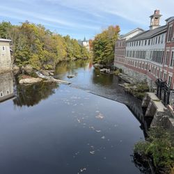 Barbour Factory Outlet - View of Milford from stone bridge in town
