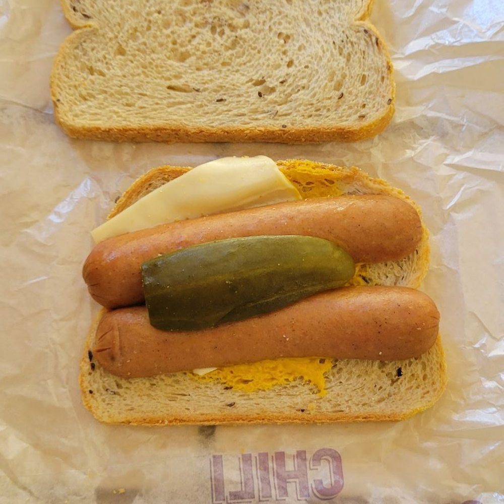 Wienerschnitzel - Polish dog (used to be toasted) sausage looks uncooked. Chili dog appears uncooked. - Fast Food Near Me - Spring Valley, California Wienerschnitzel - Polish dog (used to be toasted) sausage looks uncooked. Chili dog appears uncooked. - Fast Food Near Me - Spring Valley, California
