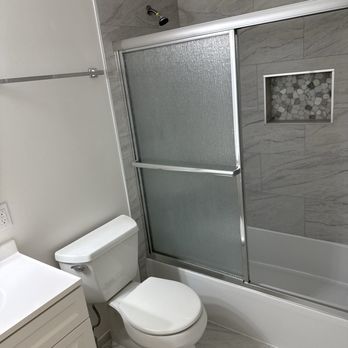 Umbrella Home Construction  - bathtub bathroom - Handyman Near Me