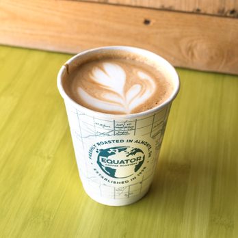 Equator Coffee Roasters - a cup of coffee on a table - Coffee Roasteries Near Me - Almonte, Ontario