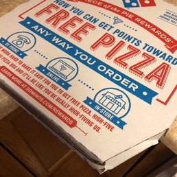 a pizza box on a counter