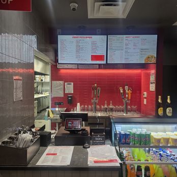 Curry Pizza House Irving - Front register, beer tap, menu, and drink cooler - Pizza Near Me - Irving, Texas Curry Pizza House Irving - Front register, beer tap, menu, and drink cooler - Pizza Near Me - Irving, Texas