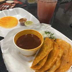 The beef quesobirria taco plate and an Agua frescas de fresa (Mexican strawberry water)