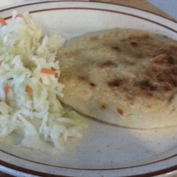 El Salvador Restaurant - Pupusa de Revueltas, filled with a mix of beans, cheese, and ground beef. - Latin American Near Me - Milwaukee, Wisconsin El Salvador Restaurant - Pupusa de Revueltas, filled with a mix of beans, cheese, and ground beef. - Latin American Near Me - Milwaukee, Wisconsin