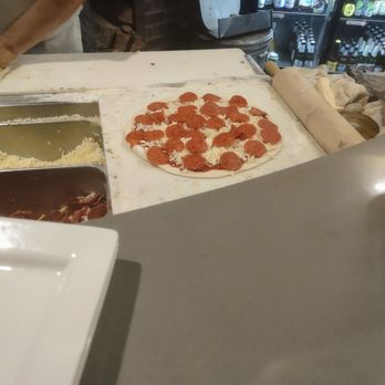 The Abbey - Pizza being crafted, no skimping going on here - Gastropubs Near Me - Seal Beach, California