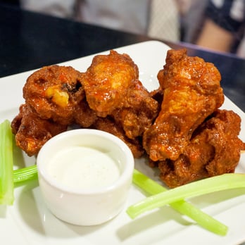 Palladium Sports Lounge - a plate of buffalo wings with ranch dip - Sports Bars Near Me - Thackerville, Oklahoma Palladium Sports Lounge - a plate of buffalo wings with ranch dip - Sports Bars Near Me - Thackerville, Oklahoma