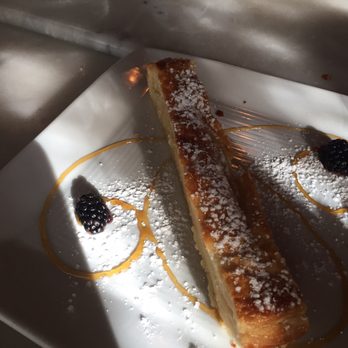 Le Rendez-vous - I'm not sure what this dessert was, but it was light, crispy, almonds and delicious!!! - French Near Me - Tucson, Arizona