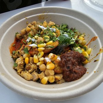 RASA - Chicken (extra shrimp) over supergrains with spiced chickpeas, corn salsa, chopped cilantro, cumin yogurt, and coriander chili. - Indian Near Me - Rockville, Maryland RASA - Chicken (extra shrimp) over supergrains with spiced chickpeas, corn salsa, chopped cilantro, cumin yogurt, and coriander chili. - Indian Near Me - Rockville, Maryland