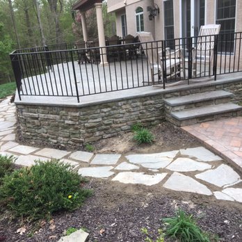 LPS Diversified - Flagstone path. Moss will fill in the space between stones. - Landscape Architects or Designers Near Me