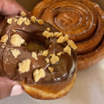 Randy's Donuts - Nutella Raised and a cinnamon roll. - Donuts Near Me - Burbank, California Randy's Donuts - Nutella Raised and a cinnamon roll. - Donuts Near Me - Burbank, California