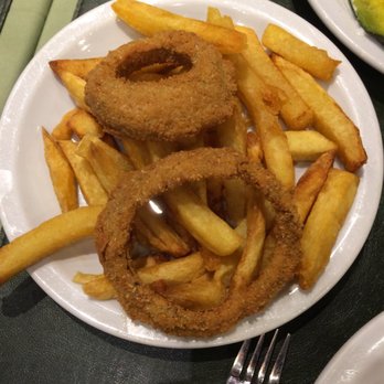 La Pharmacie - The side of French fries - they were amazing only needed salt, the two onion rings were overly breaded and would not recommend them. - Argentine Near Me - Buenos Aires, C