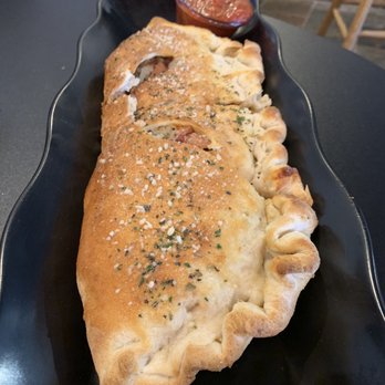 Coop's Pizzeria - Meatatarian Calzone - Pizza Near Me - Salina, Kansas Coop's Pizzeria - Meatatarian Calzone - Pizza Near Me - Salina, Kansas