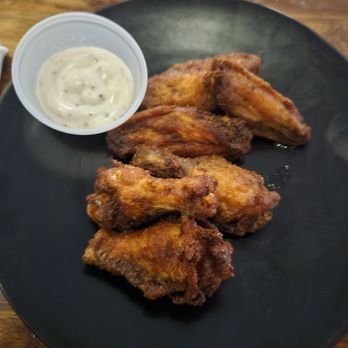GuestHouse Restaurant & Bar - Wing (lemon pepper $1 extra) special for an after-work party. - Sports Bars Near Me - Brooklyn, New York