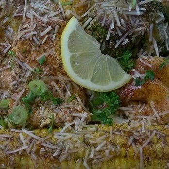 Chef Oya's The Trap - Loaded Salmon with Shrimp - added parmesan cheese and the OG Garlic Herb Buttah - American Near Me - Indianapolis, Indiana Chef Oya's The Trap - Loaded Salmon with Shrimp - added parmesan cheese and the OG Garlic Herb Buttah - American Near Me - Indianapolis, Indiana