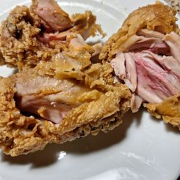 a fried chicken sandwich on a plate