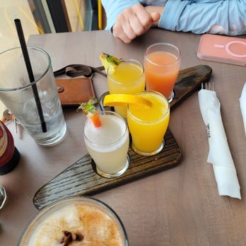 Brunch House - Mimosa flight- strawberry basil, oranges, pineapple and guava  Chai latte - Breakfast & Brunch Near Me - Grand Rapids, Michigan