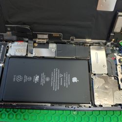 Elite Support Technologies - iPhone repair in progress.