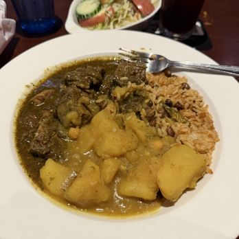 Pam's Caribbean Kitchen - Curry Goat (GF), rice & peas - Trinidadian Near Me - Seattle, Washington Pam's Caribbean Kitchen - Curry Goat (GF), rice & peas - Trinidadian Near Me - Seattle, Washington