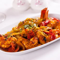 King Prawn Dish - Tender pieces of grilled king prawns cooked with capsicum, red onion & fresh green chillies in a fairly dry sauce. hot.