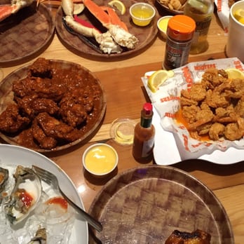 Hooters - Wings shrimp oysters onion rings and fries a hooter feast - American Near Me - Oak Lawn, Illinois Hooters - Wings shrimp oysters onion rings and fries a hooter feast - American Near Me - Oak Lawn, Illinois