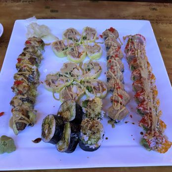 To Yo Sushi - Clockwise from left: Dragon roll, Love roll, Special Spicy Tuna roll, Big Christmas roll, and Spider Roll - Sushi Bars Near Me - Philadelphia, Pennsylvania To Yo Sushi - Clockwise from left: Dragon roll, Love roll, Special Spicy Tuna roll, Big Christmas roll, and Spider Roll - Sushi Bars Near Me - Philadelphia, Pennsylvania