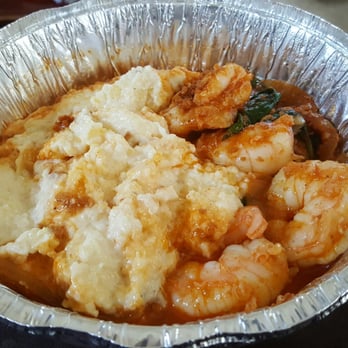 The Flipside Cafe - This is their "famous" shrimp & grits w/ spinach. U can see I only got 4 shrimps & 1 leaf of spinach w/ 1 cup of grits. - Breakfast & Brunch Near Me - Fort Mill, South Carolina