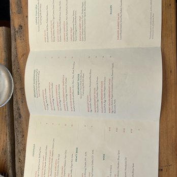 Lost Pig Cafe - a menu on a wooden table - New American Near Me - Leavenworth, Washington Lost Pig Cafe - a menu on a wooden table - New American Near Me - Leavenworth, Washington