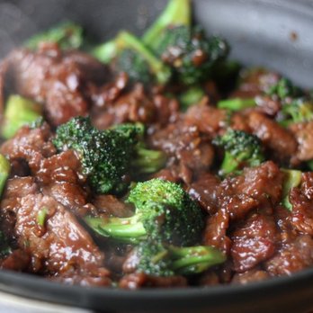 Panda House - beef and broccoli cooking in a wok - Chinese Near Me - East Lansing, Michigan Panda House - beef and broccoli cooking in a wok - Chinese Near Me - East Lansing, Michigan