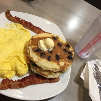 Perkins American Food - Blueberry pancakes with scrambled eggs and bacon. - Bakeries Near Me - Cedar Rapids, Iowa Perkins American Food - Blueberry pancakes with scrambled eggs and bacon. - Bakeries Near Me - Cedar Rapids, Iowa