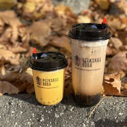 Peekskill Boba - Mango milk tea with kiwi popping bubble (small) and Spooky black sugar with pumpkin milk tea base and brown sugar boba (large). YUM!!