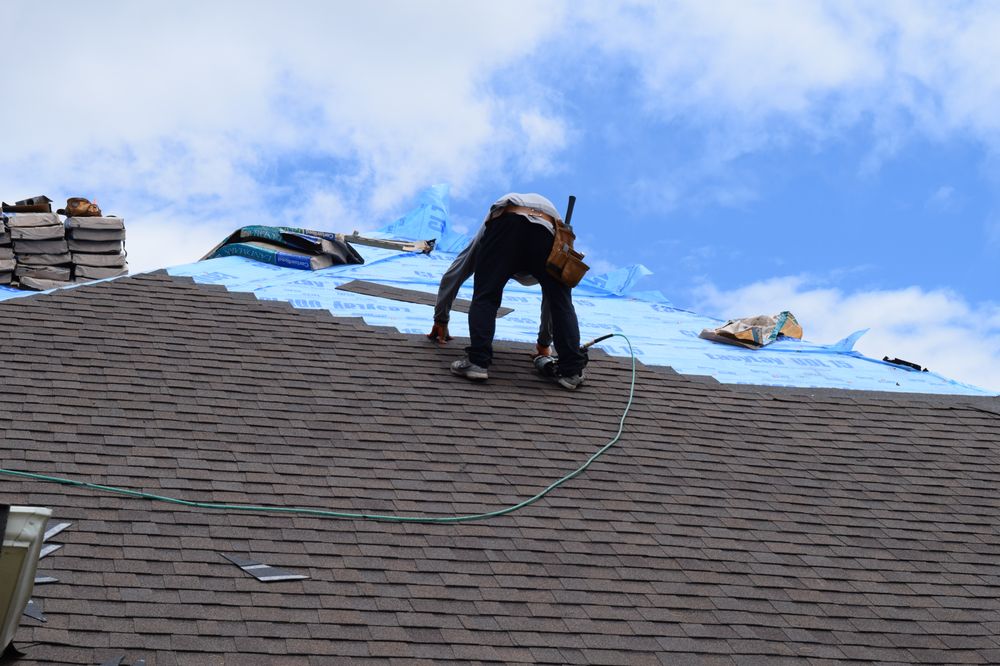 Slide of Top Notch Roofing