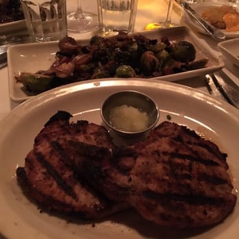Harry & Izzy's - Pork chops and Brussels sprouts with bacon. - Steakhouses Near Me - Indianapolis, Indiana Harry & Izzy's - Pork chops and Brussels sprouts with bacon. - Steakhouses Near Me - Indianapolis, Indiana