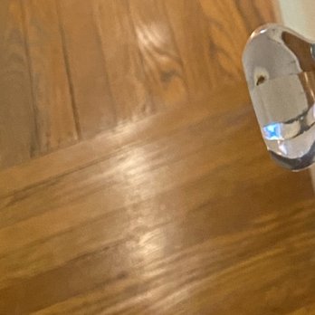Elite Hardwood Flooring - Pic A - Original flooring (before Elite Hardwood) - dated yellow stain.  Scratched and scuffed from previous owners' pets. - Flooring Near Me - San Mateo, California