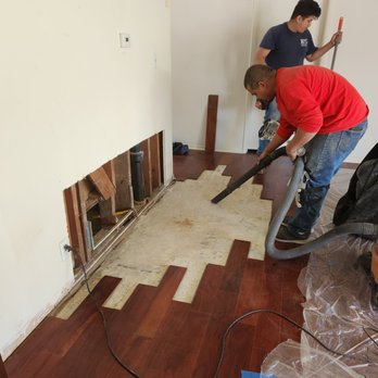 RonDell Restoration - two men working on a hardwood floor - Damage Restoration Near Me - Garden Grove, California